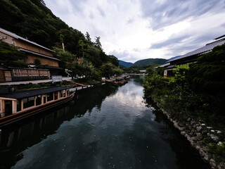 river beside mountains heading to the blue sky