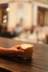 headlight of a retro car close-up. burgundy retro car on the street. stylish vintage car in red