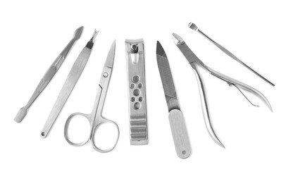 Manicure set on white background, top view