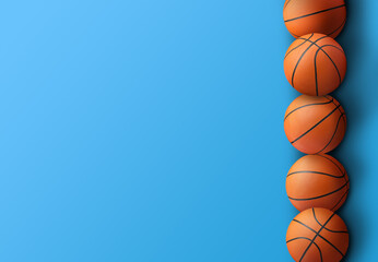Obraz premium Many orange basketball balls on blue background. Space for text