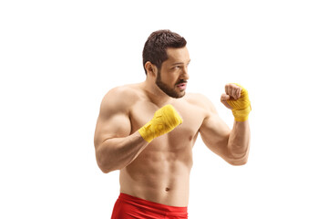 Boxer exercising kickboxing