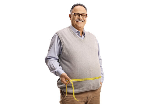 Mature Man In Casual Clothing Measuring Waist With A Tape