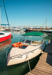 Fototapeta premium Beautiful yacht standing in port