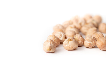 Isolated dry chickpeas. Versatile superfood legume, high in protein and fiber. Known as garbanzo bean, bengal gram or Cicer arietinum. Used for hummus, veggie burgers and falafel. Selective focus.