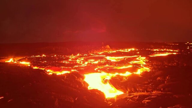 Timelapse. Hot lava spreads after a volcanic eruption