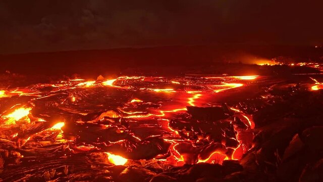 Timelapse. Hot lava spreads after a volcanic eruption