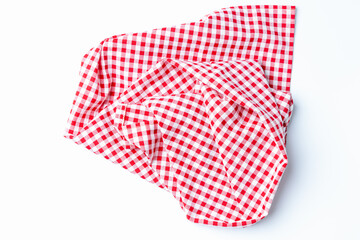 Fabric red and white crumpled isolate on white background. Tablecloth checkers top views with copy space for text.