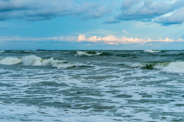 Sea coast. Waves and storms at sea. Waves on the Baltic Sea.