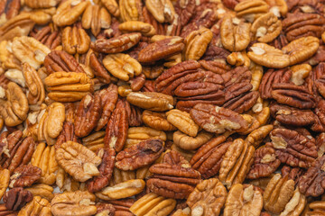 Tasty pecan-nut background. Top view.