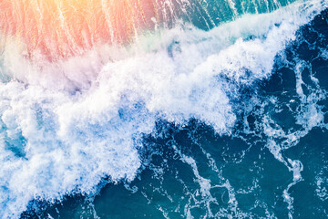 Fototapeta na wymiar Open mediterranean sea from aerial top view. Turquoise water frothy indonesia ocean surface with big wave