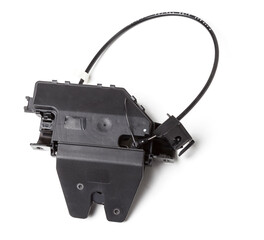 Detail of a car spare part made of black plastic and metal - rear trunk lock separately isolated on a white background. Repair in a car workshop, equipment for sale.