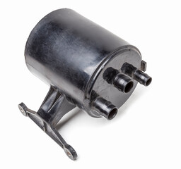 Spare part of the car vapor fuel absorber filter for cleaning gasoline and diesel before getting into the engine close-up on a white isolated background to perform vehicle maintenance in auto service.