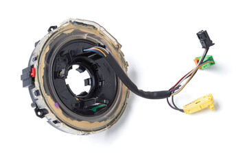  steering column cable disassembled on a white isolated background, spare part for car repair or for sale at junk yard.