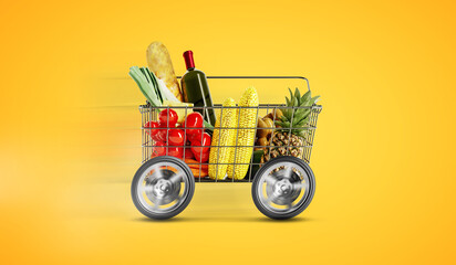 Shopping cart with food delivery service background concept. Shopping basket with vegetables fruits and food with wheels deliver order. - 435879665