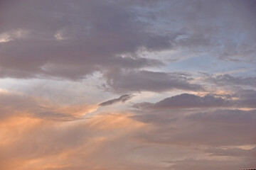 Naklejka na ściany i meble Evening sunset sky with clouds in summer