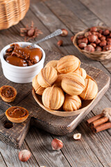 Sweet national Russian nuts with condensed milk on table