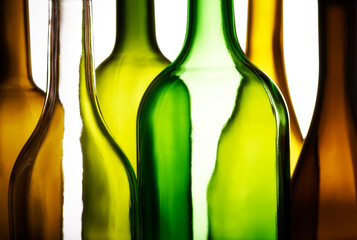 Set of empty glass bottles isolated on white background. Close-up