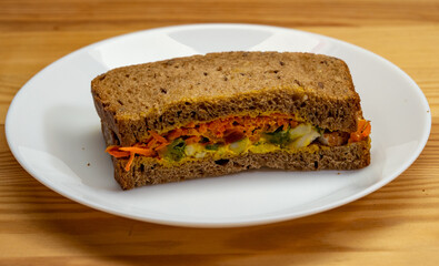 fresh sandwich on wood background