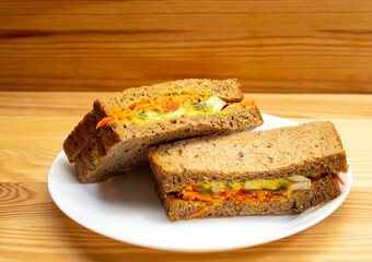 fresh sandwich on wood background