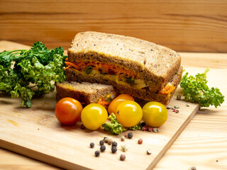 fresh sandwich on wood background