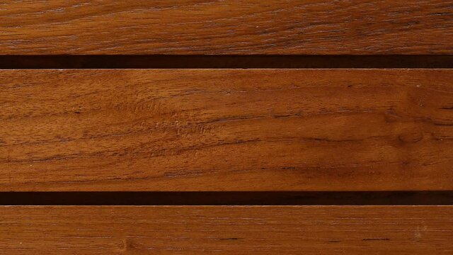Close-up texture of Wooden Floors. Solid real home architecture Wood Floors background. Camera 4k Slide from motorized slider.