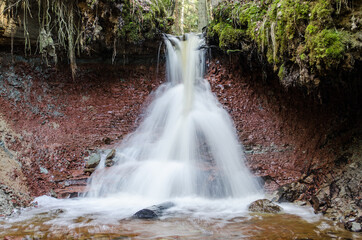 Fototapeta na wymiar Beautiful Zartapu waterfall in Slitere, Latvia.
