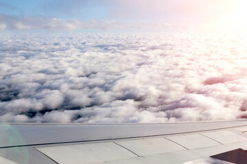 Wing airplane by airplane window frame, concept travel and freedom.