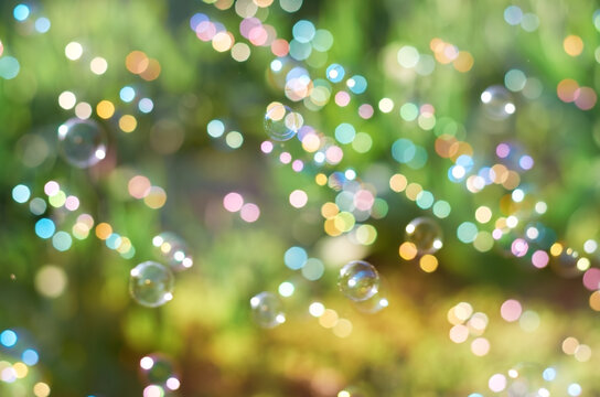 blurry soap bubbles on a colorful blurry background