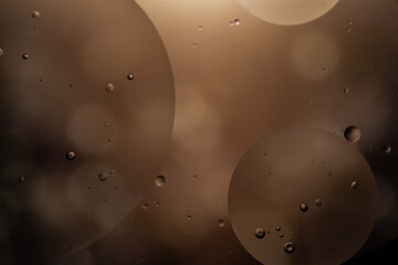 Abstract background of blurred circles, bokeh lights and waterdrops