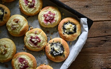 baked traditional sourdough buns with cottage cheese filling and poppy seed filling