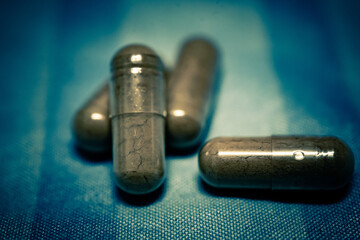 Pharmaceutical medicine pills in both tablets and capsules with the vintage retro picture style....