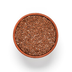 Flax seeds in a ceramic bowl isolated on white background. Top view.