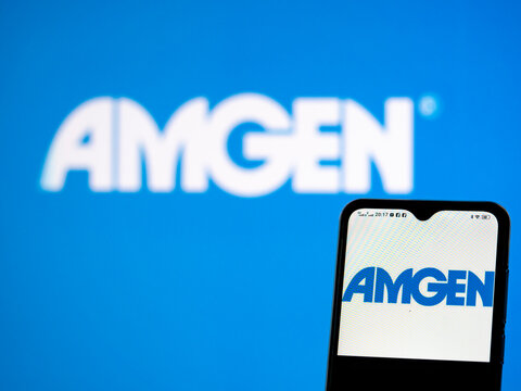  In this photo illustration AMGen, Inc. logo seen displayed on a smartphone