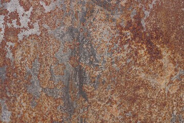 red brown metal texture from a piece of old rusty iron wall