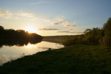 Fototapeta na wymiar quilet wild sunset on the rive