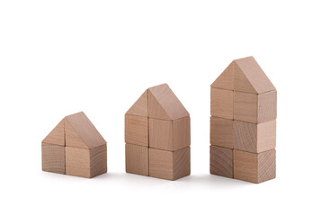 Three different wooden block houses isolated on white background with clipping path