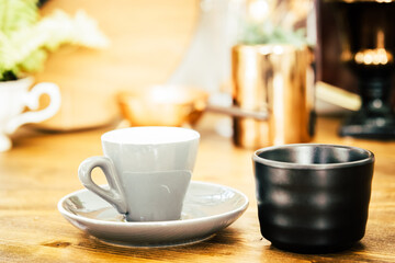 Coffee cup and beans on old vintage table. Top view with copy space for your text into the background.	
