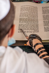 bar-mitzva kid reading the bible