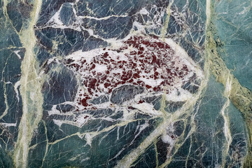 Diabase green stone texture. Construction, building cladding.