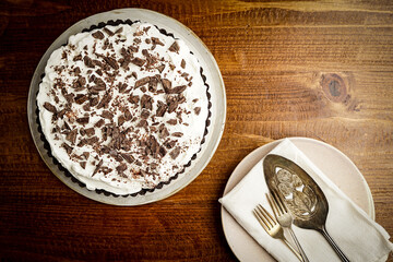 Banoffee pie with shaved chocolate and whipped cream