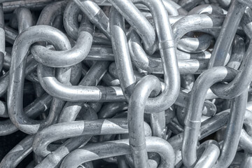 Closeup of Construction metal silver chains as background