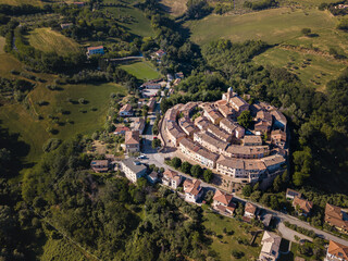 Italy, May 2021. Aerial view of the medieval village of Serrungarina in the province of Pesaro and...