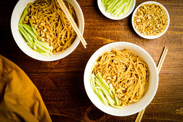 Sesame noodles with chopped peanuts and fresh cucumber
