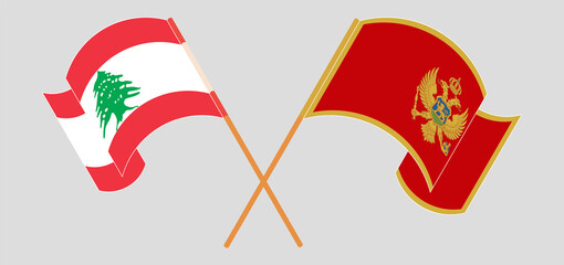Crossed and waving flags of the Lebanon and Montenegro