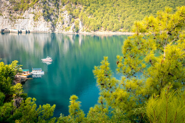 Fototapeta premium Dam lake in Green Canyon. Beatiful View to Taurus Mountains and turquoise water. Coniferous forest with bright green pine trees. Manavgat, Turkey