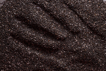 Chia seeds. chia seed background with handprint. Superfood