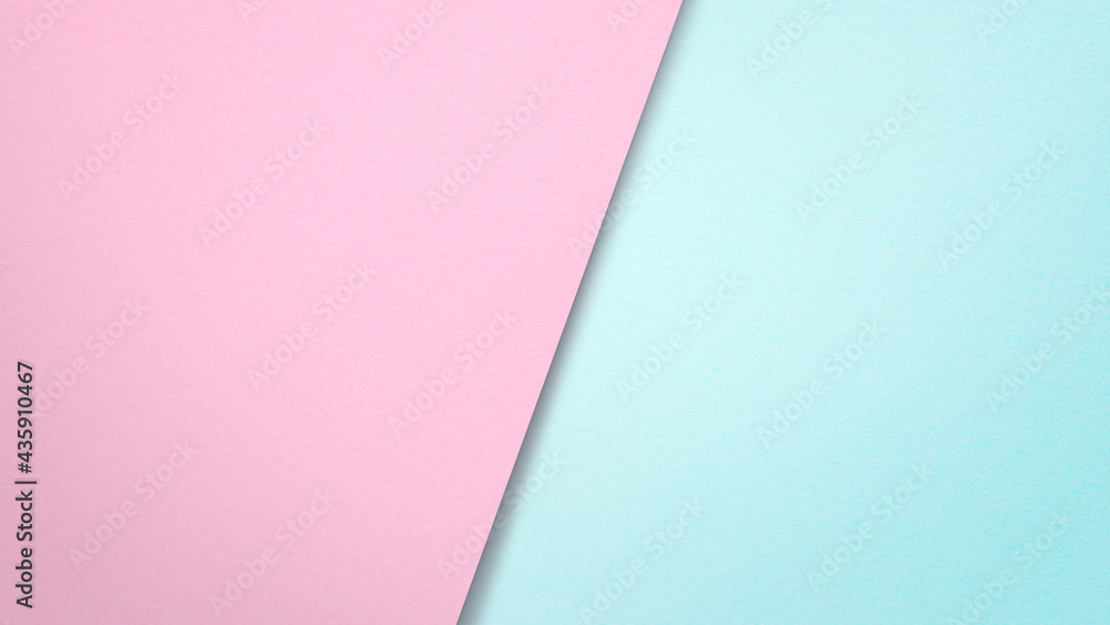 Poster clean sheet of pink paper overlayed with turquoise colored paper. simple and minimal abstract textur