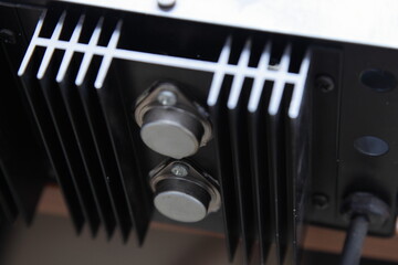 Rear panel of the electric inverter with powerful diodes and large cooling fins