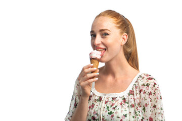 Red hair model eating ice-cream in studio