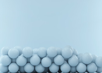 Spheres on blue studio background with space for text or design.
